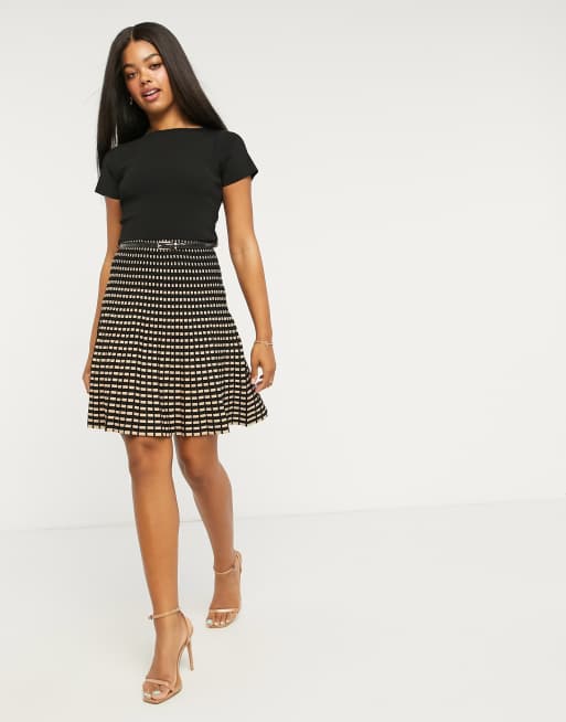 Black and white fit outlet and flare mini skirt