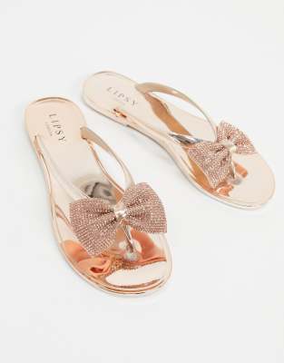 rose gold bow flip flops