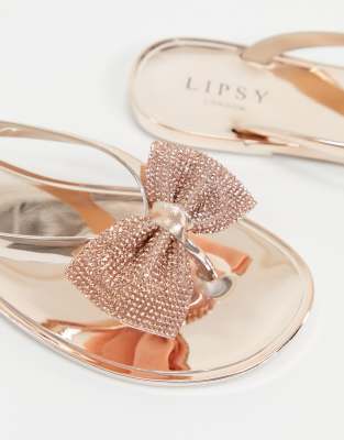 rose gold bow flip flops