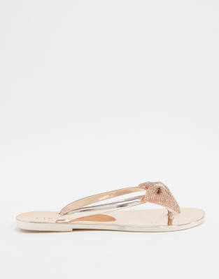 rose gold bow flip flops