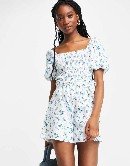 Lipsy shirred short sleeve belted romper in blue floral print