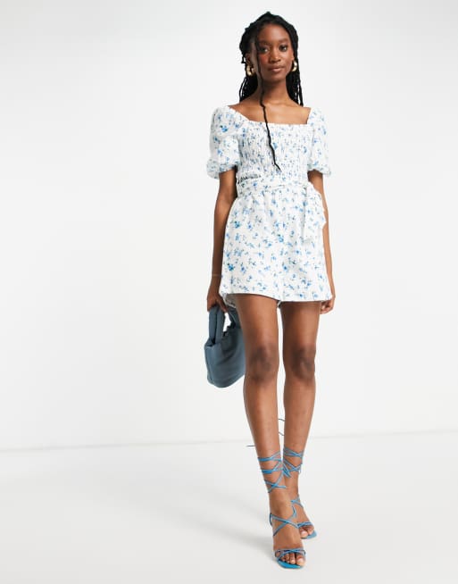 Lipsy shirred short sleeve belted romper in blue floral print