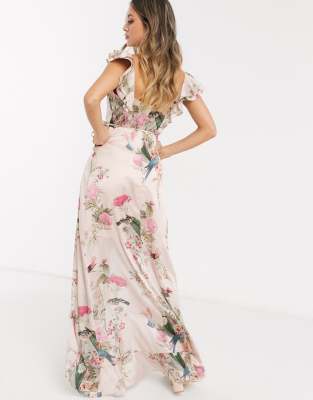 Lipsy x Abbey Clancy wrap front ruffle midi dress in pink floral print