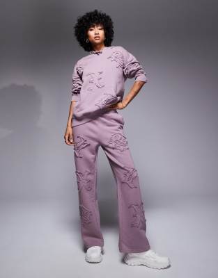 Liquor N Poker allover motif straight leg jogger co-ord in berry mix-Red