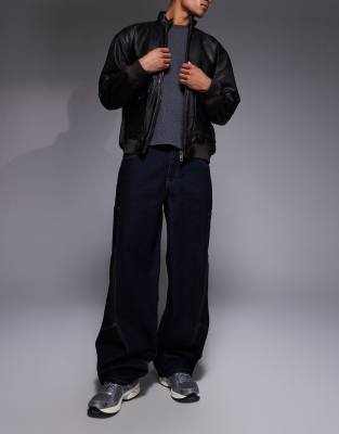 Liquor N Poker Liquor N Poker baggy spliced side pocket jeans in black
