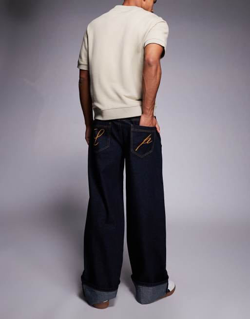 Liquor N Poker cinch midrise turn up baggy denim jeans with contrast stiching in darkwash blue
