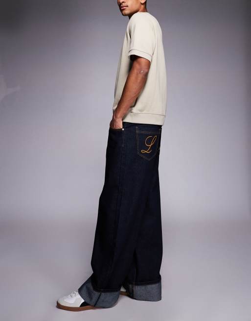 Liquor N Poker cinch midrise turn up baggy denim jeans with contrast stiching in darkwash blue