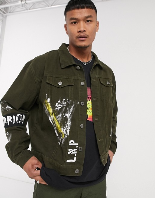 Liquor N Poker denim jacket with warrior arm band and paint in khaki
