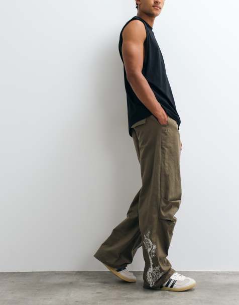 Liquor N Poker japanese embroidered parachute trousers in dark green