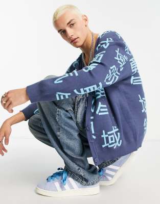 Liquor N Poker knitted cardigan in blue with all over japanese text print