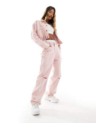 Liquor N Poker mid rise baggy fit jeans in pink acid with knee rip - view 1