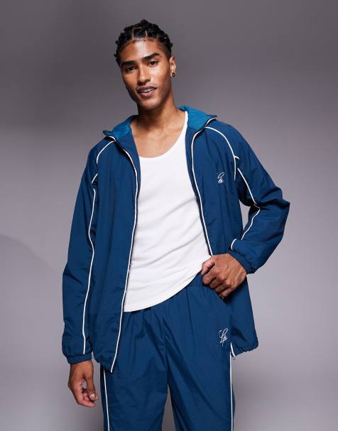 Liquor N Poker nylon track jacket co-ord with logo and piping detail in navy - view 1
