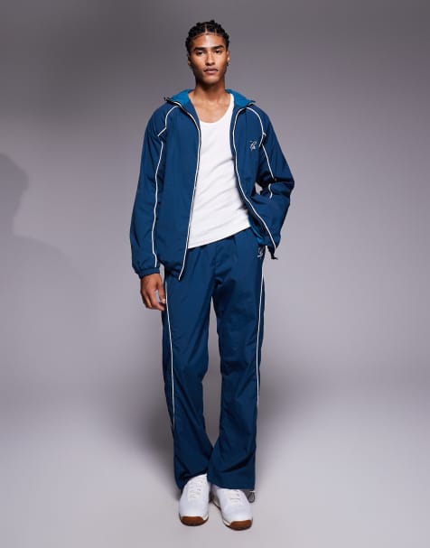 Liquor N Poker nylon track jacket & jogger co-ord with logo and piping detail in navy - view 1