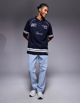 Liquor N Poker Oversized Logo Polo With Contrast Stripes And Collar In Blue