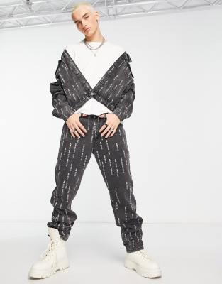 Liquor N Poker oversized straight leg denim jeans in black with all over japanese text print (part of a set)