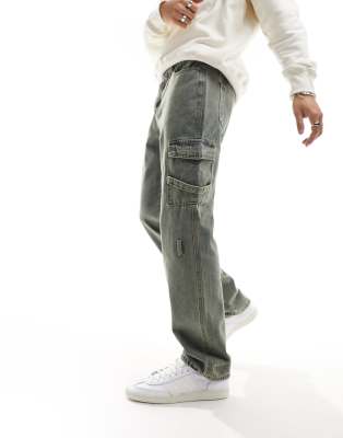 relaxed cargo jean with strap in dirty green wash - part of a set