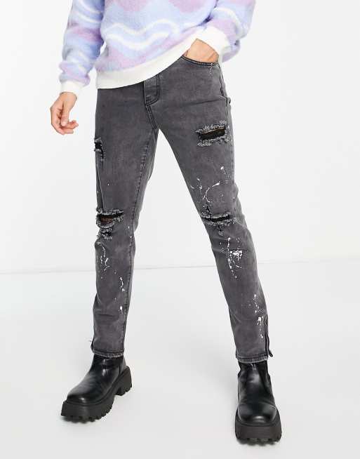 Liquor N Poker – Schmal geschnittene Denim-Jeans in verwaschenem Schwarz mit Farbklecks-Detail