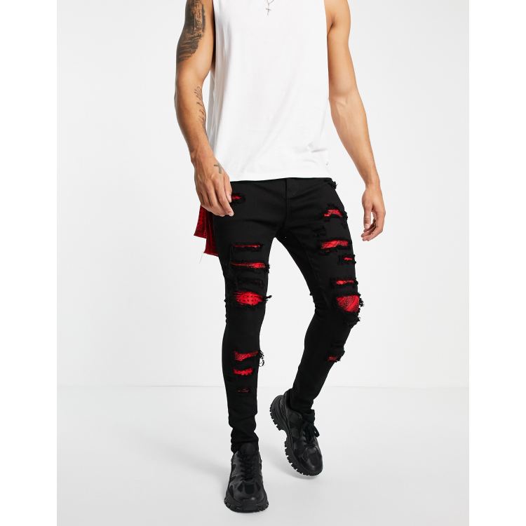 Liquor N Poker skinny jeans in black with red bandana distressed