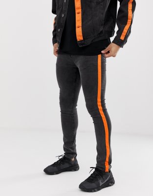 black jeans with orange stripe