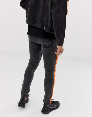 black and orange striped pants