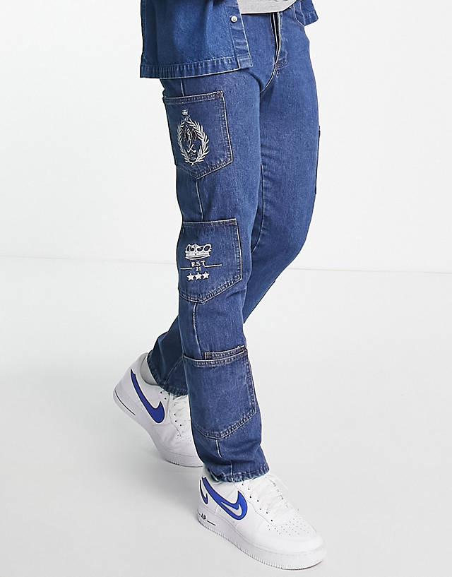 Liquor N Poker - straight leg jeans in midwash blue denim with extra pockets