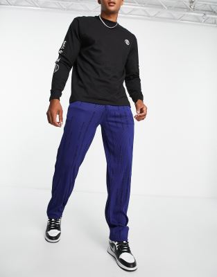 Liquor N Poker Straight Leg Plisse Pants In Navy With All-over Japanese Text Print-black