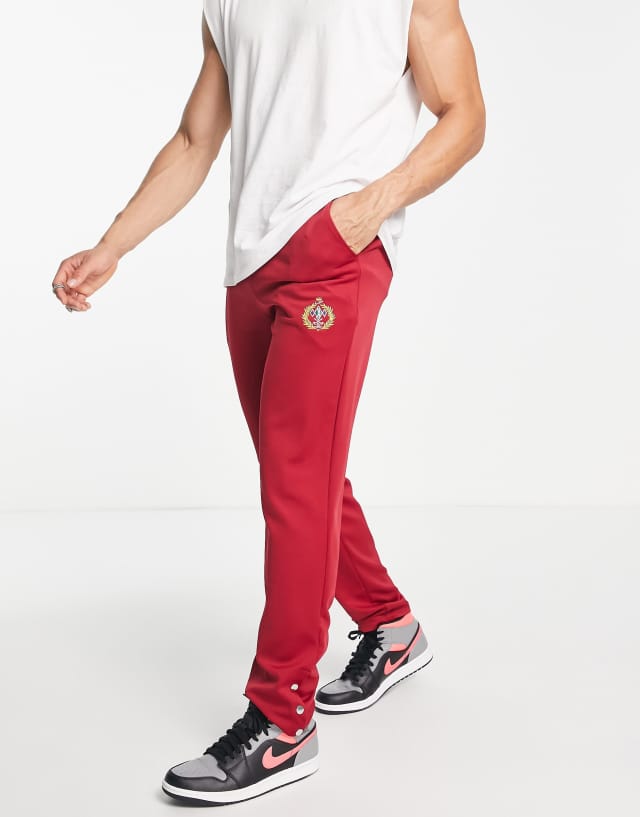 Liquor N Poker straight leg sweatpants in burgundy with golf club embroidery and snap hem