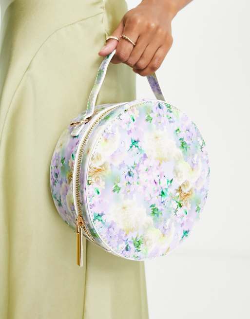 Liquorish - Bruidsmeisjes - Ronde tas met bloemenprint in multi