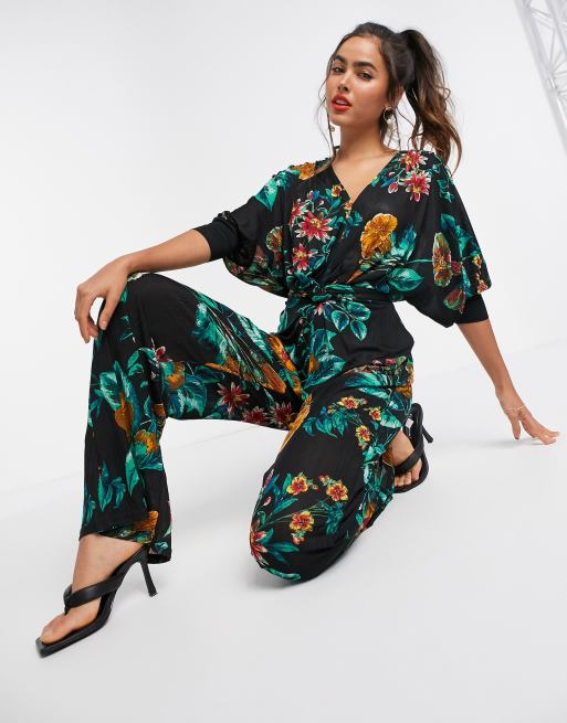 Liquorish - Jumpsuit met wijde pijpen en tropische print