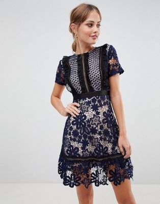Liquorish - Kanten mini-jurk met contrasterende voering-Marineblauw