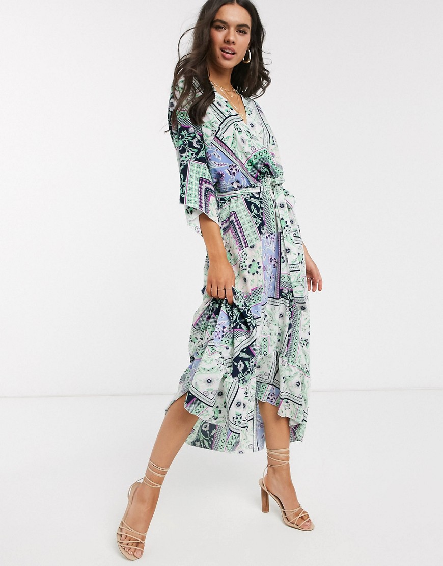 Liquorish - Lange jurk met overslag en ongelijke zoom in patchwork-bloemenprint-Multi