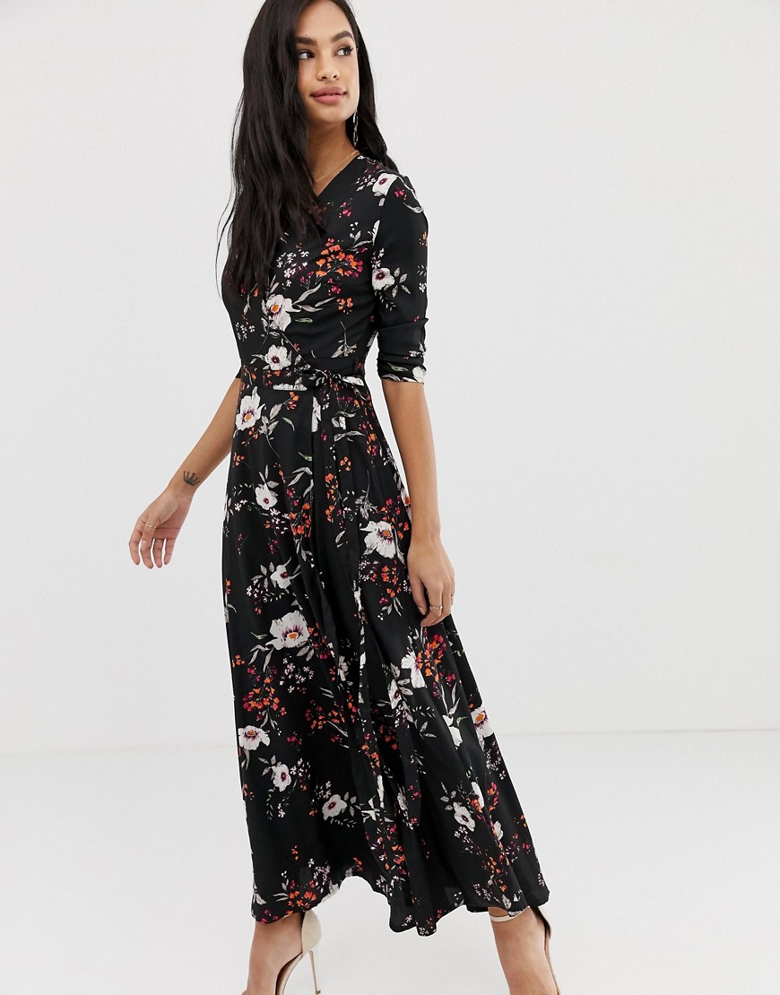 Liquorish - Lange jurk met overslag, striktaille, split in de pijp en bloemenprint-Multi