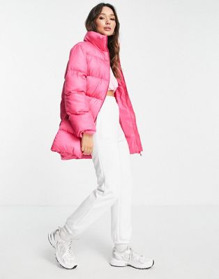Liquorish longline puffer coat in bright pink