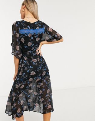 dark floral dress with sleeves