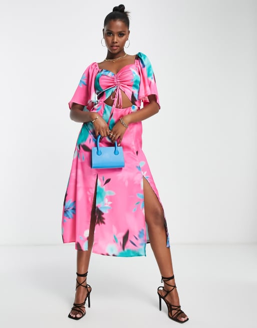 Liquorish - Robe mi-longue à fleurs et découpe sur le devant - Rose