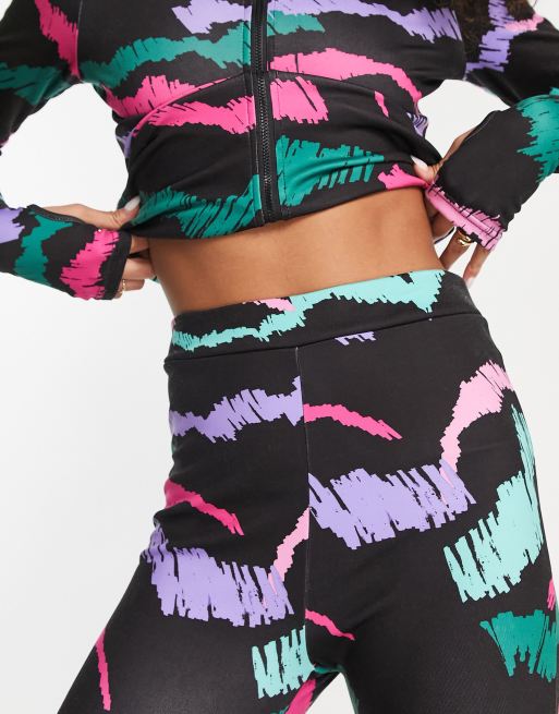 Liquorish Ski base layer leggings in abstract multi colour print