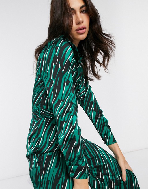 Liquorish wrap jumpsuit with wide leg in abstract print