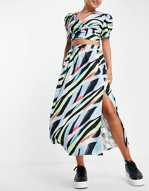 Liquorish wrap midi skirt in abstract print
