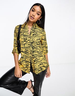 Liquorish zebra print shirt in mustard