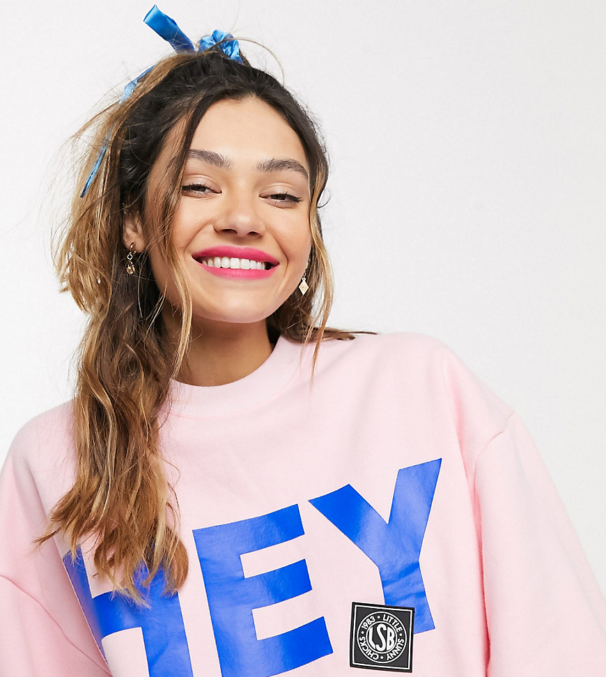Little Sunny Bite – T-shirt i sweatshirtmaterial med oversize-passform och hey yo-text-Rosa