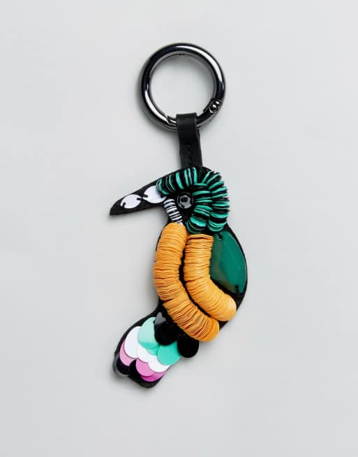 Llavero con diseño de loro con lentejuelas Polly de ASOS