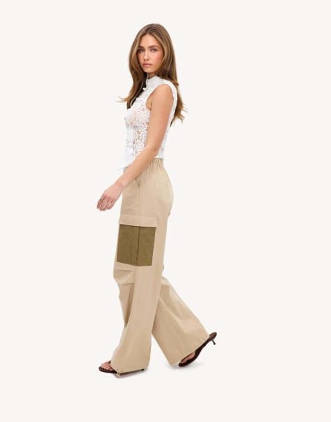 Loavies Captured in time parachute trousers with green pockets in sand