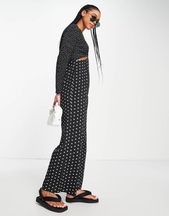 https://images.asos-media.com/products/lola-may-cut-out-wide-leg-jumpsuit-in-polka-dot/202486885-3?$n_550w$&wid=550&fit=constrain