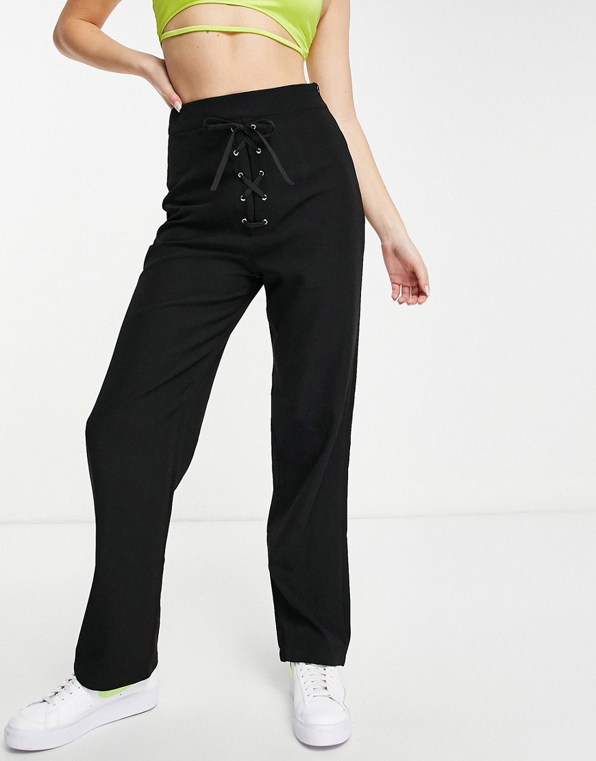 Lola May eyelet lace up front wide leg pants in black