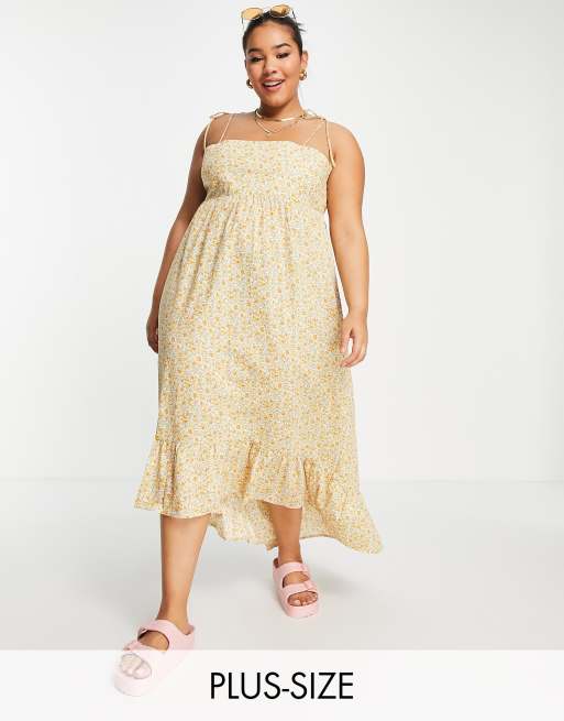 Lola May Plus – Midaxi-Kleid mit Trägern zum Binden und Schößchen in Creme mit Blumenmuster