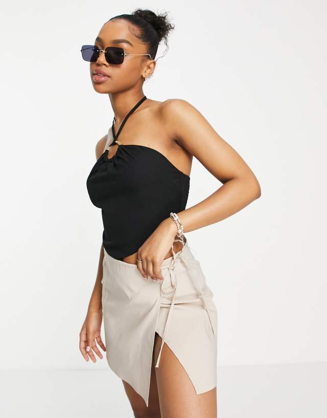 Lola May ring front halter neck crop top in black