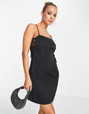 satin cami mini dress with lace up sides in black