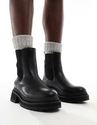 London Rebel - Becky - Klobige Chelsea-Stiefel in Schwarz mit mittelhohem Schaft