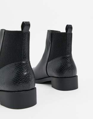 bottines noires serpent