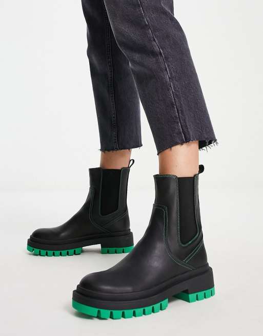 Black and 2024 green boots